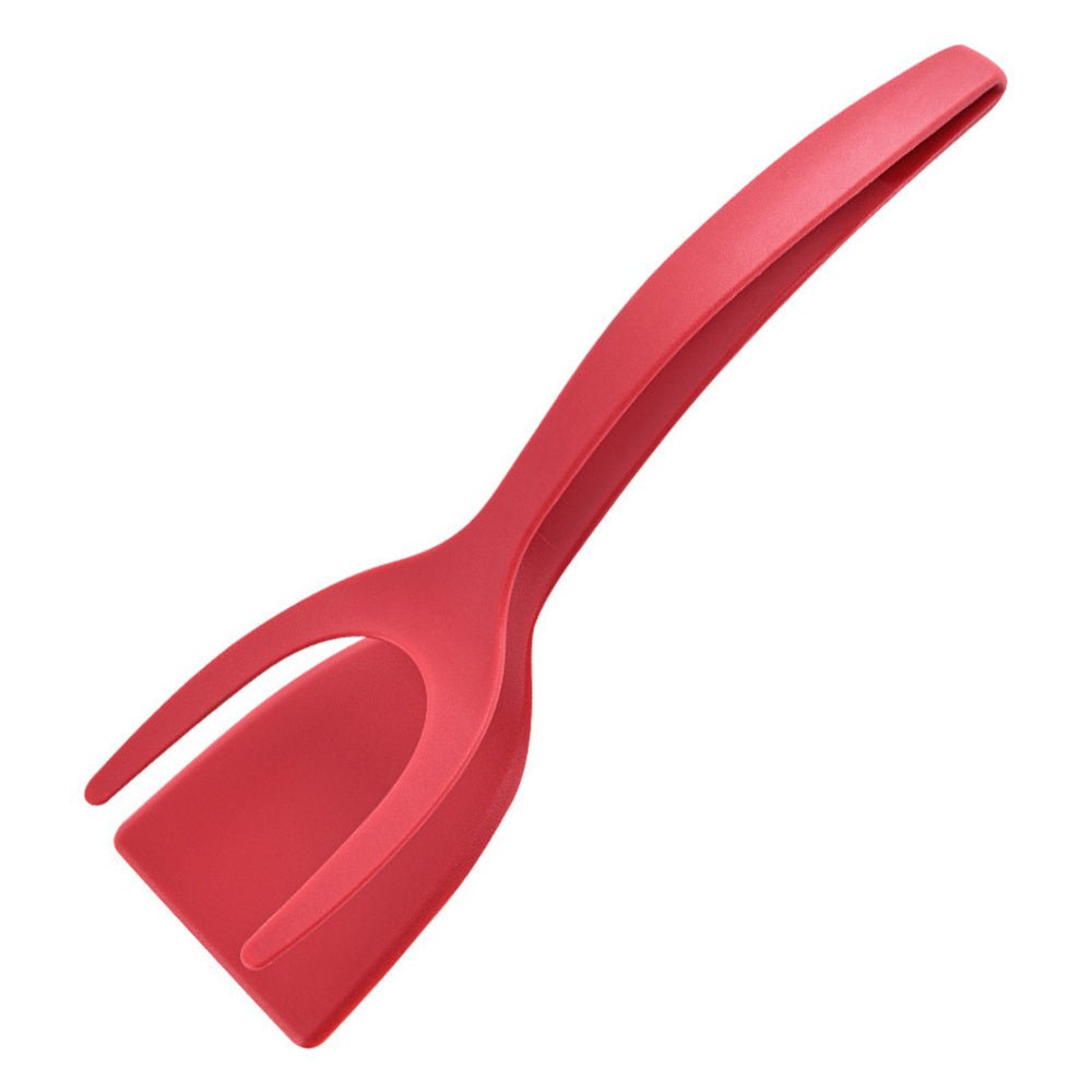 Red 2-in-1 spatula tongs for flipping eggs and pancakes in the kitchen.