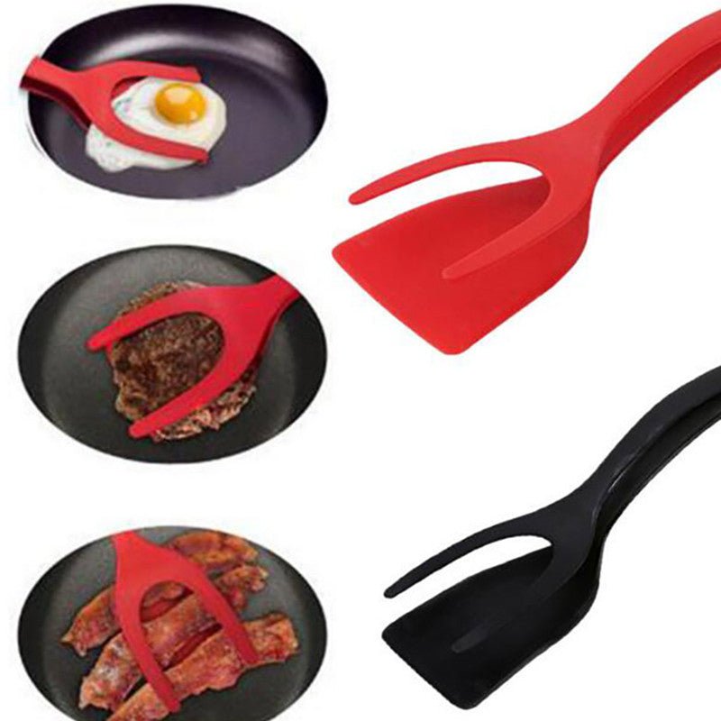 2-in-1 spatula tongs for flipping eggs, pancakes, bacon. Red and black kitchen utensil.