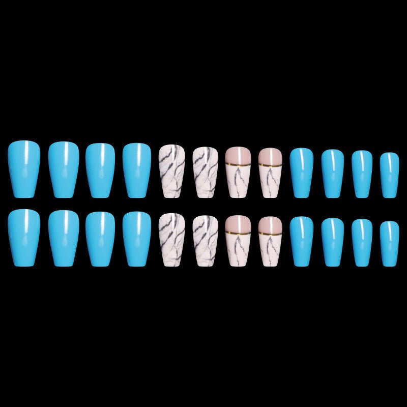 Set of coffin-shaped press-on nails: solid blue, marble, and marble with gold accent.