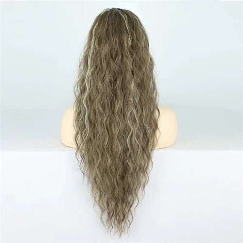 Long wavy ponytail extension in ash brown with blonde highlights.