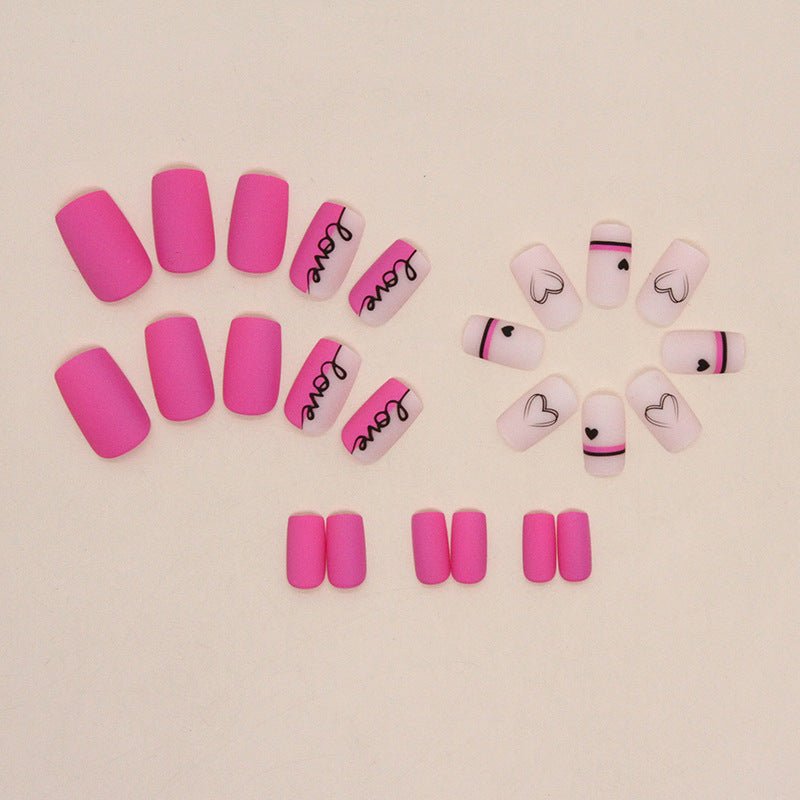 Valentine's Day press-on nails: pink, 'love' script, heart designs.