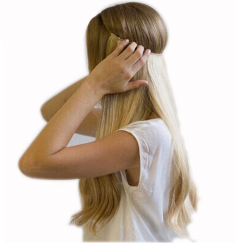 Blonde woman applying 20" halo hair extension. Invisible wire, no clips, synthetic hairpiece.