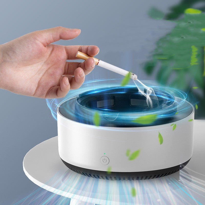 Portable air purifying ashtray with smoke removal and anion purification shown with a lit cigarette.